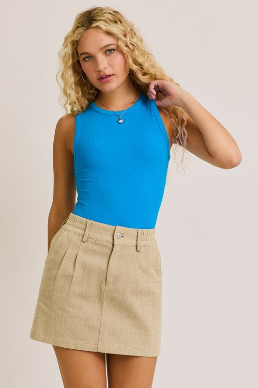 Blue ribbed bodysuit front view with high round neckline