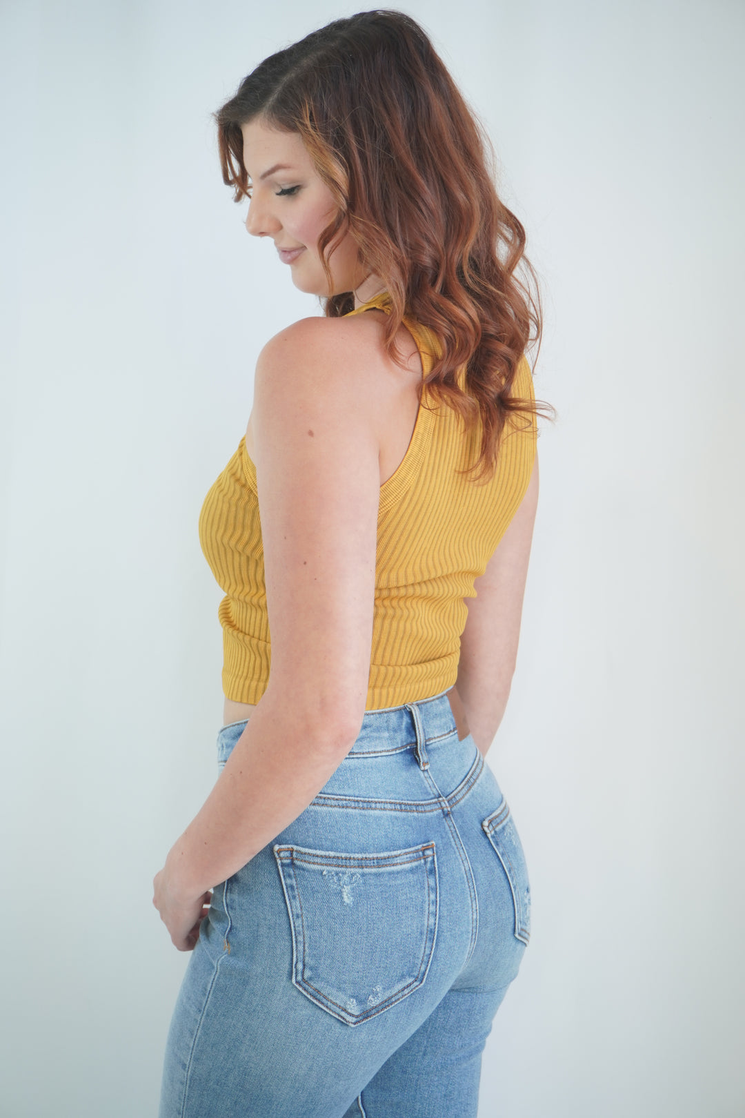 Woman wearing vintage nugget ribbed crop tank for casual look