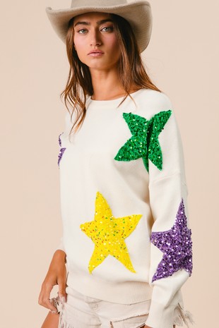 Mardi Gras sequin star sweater in purple, green, and gold colors