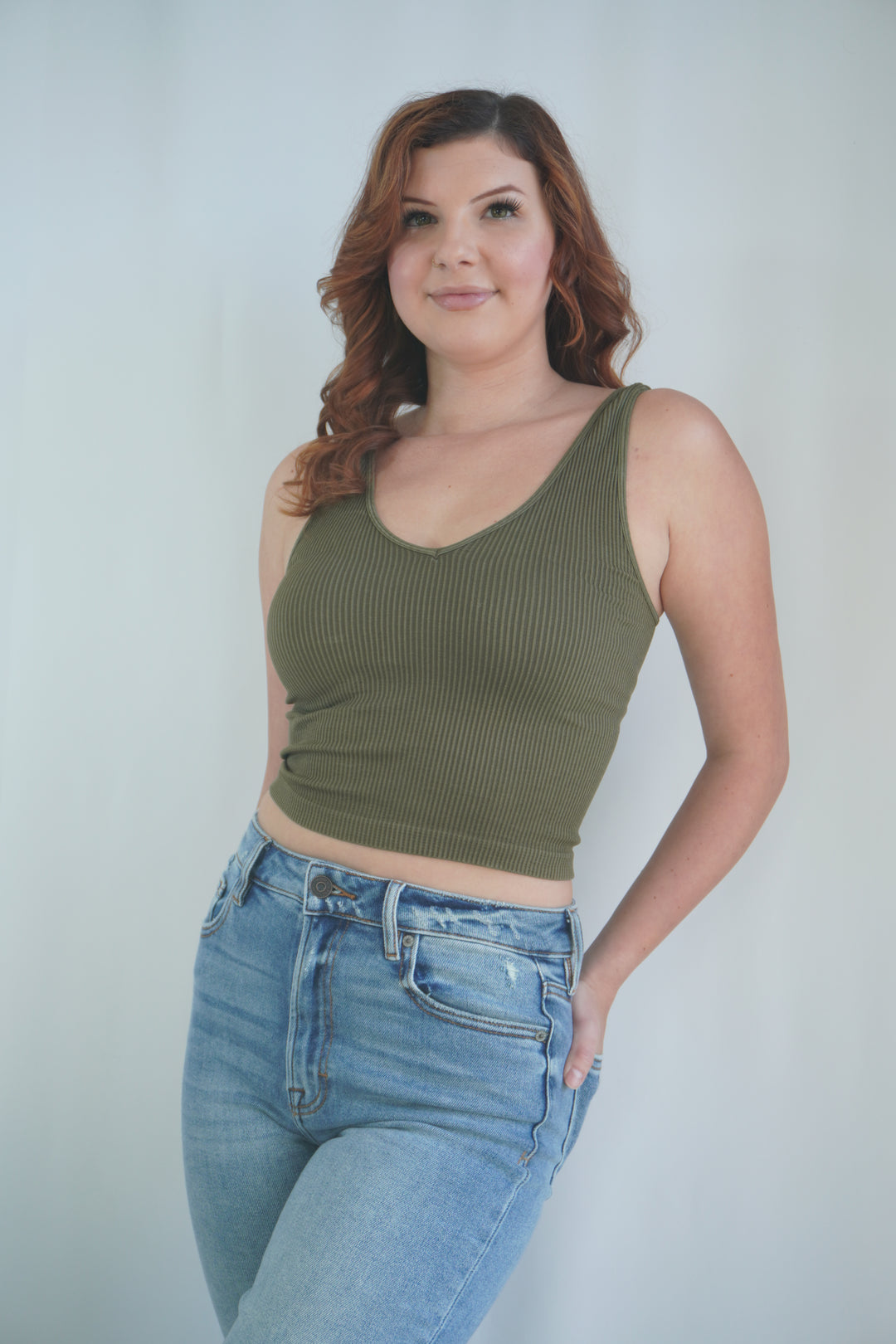 Moss green ribbed crop tank top with scoop neckline and broad shoulder straps