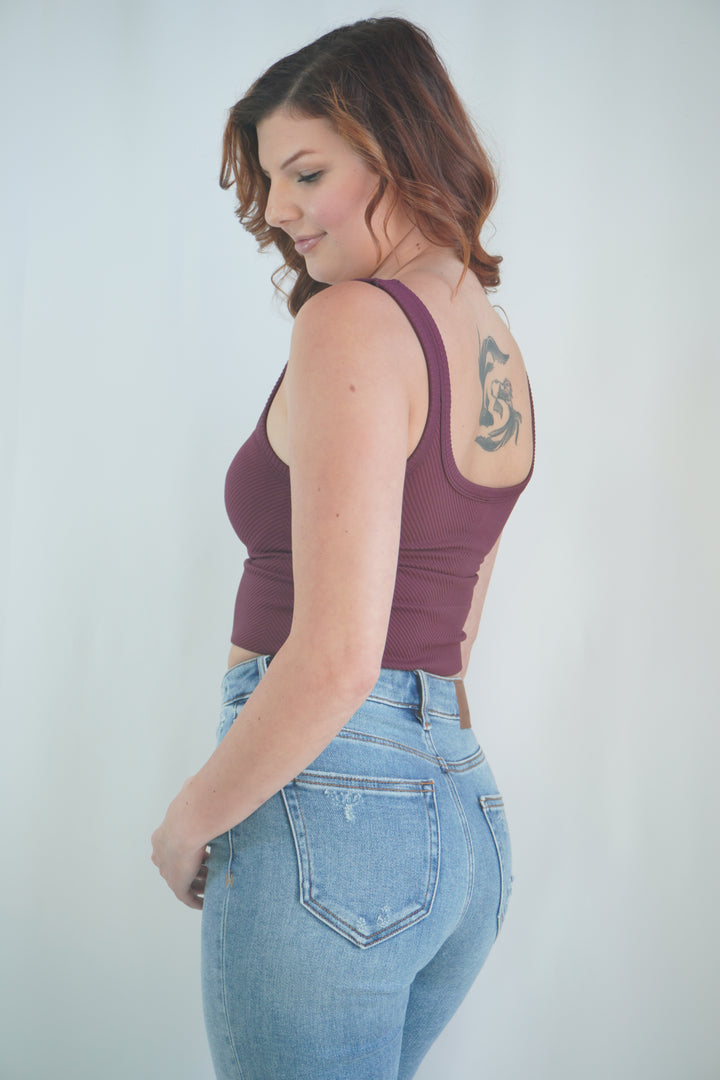 Side view of cropped fig tank with thick shoulder straps