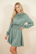 Front view - sultry blonde model in teal satin dress