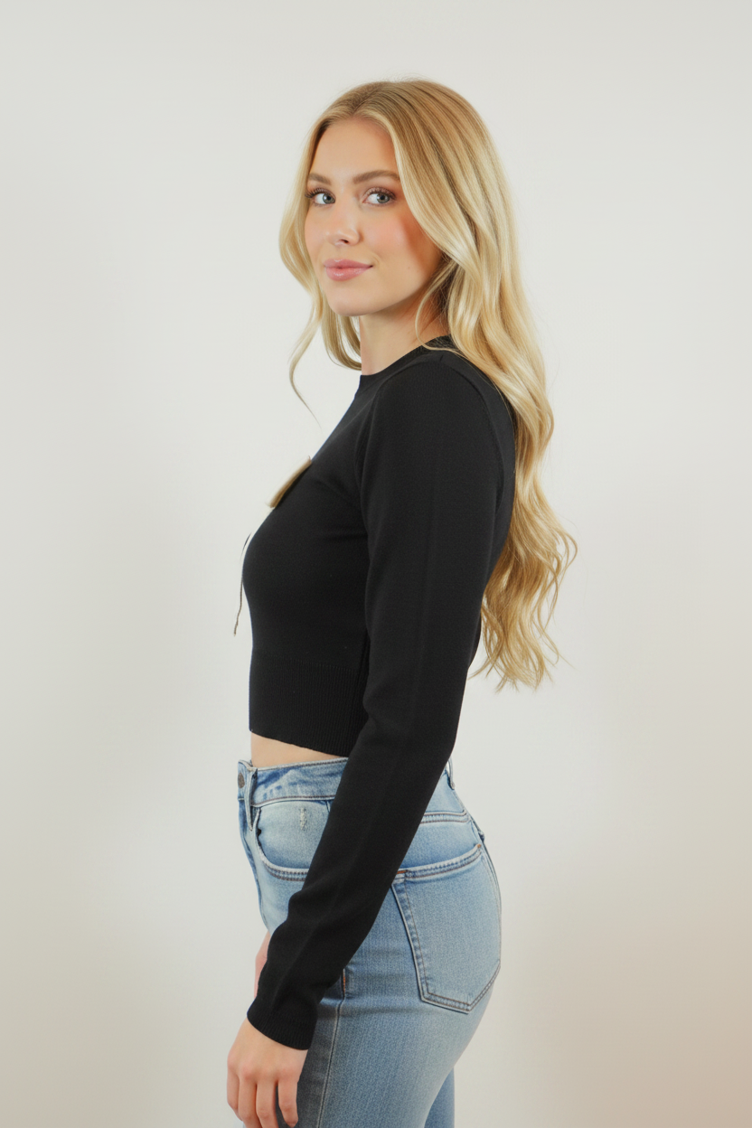 Side view - blonde model in black bow crop sweater